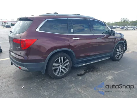 2017 Honda Pilot Touring z USA, uszkodzony, nr VIN 5FNYF5H95HB029847